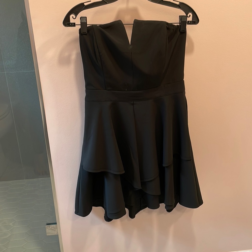 Cute black strapless dress. Never worn, tags still on
